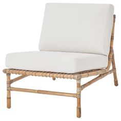 a chair made out of wood and white fabric with a cushion on it's back