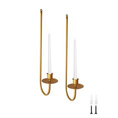 two candle holders with one light on each side and the other in gold plated metal