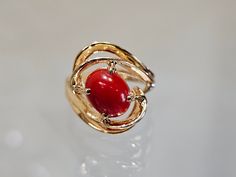 Circa 1985, a 14k yellow gold 9 x 7mm oval red carnelian cabochon ring size 6. Weight is 5.9 grams. Stamped 14k. Condition is very good. Thanks for looking.    ERA - Circa 1985, Vintage METAL / MATERIAL - 14k yellow gold  MARKINGS / HISTORY - Stamped 14k  CONDITION - The overall condition is very good! A true representation of 1980s-era jewelry! SIZE / MEASUREMENTS - 9 x 7mm oval red carnelian cabochon / size 6 / Weight is 5.9 grams. VINTAGE/ANTIQUE/HANDMADE - This item is VINTAGE. Add this timeless piece to your estate collection, to your wardrobe to jazz up any outfit, or gift it to an admirer of all things vintage and heirloom. Thanks for looking! DISCLAIMER - *Please note that the majority of vintage and antique items will reflect slight imperfections due to time, age, and previous use Yellow Gold Carnelian Oval Cabochon Ring, Formal Gold Carnelian Ring, Yellow Gold Oval Cabochon Carnelian Rings, Formal Carnelian Gold Ring, Carnelian Yellow Gold Rings With Oval Cabochon, 14k Gold Polished Oval Cabochon Ruby Ring, 14k Gold Ruby Ring With Oval Cabochon, 14k Gold Red Cabochon Ring, 14k Gold Cabochon Red Ring