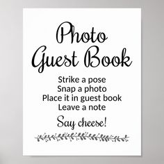 a sign that says photo guest book strike a pose snap a photo place it in the guest book leave a note say cheese