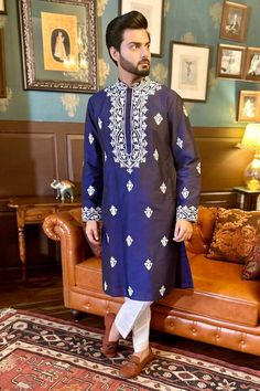 Blue kurta with thread embroidered floral patterns. Comes with pant style pyjama. - Aza Fashions Bollywood Style Blue Sherwani With Floral Embroidery, Royal Blue Long Sleeve Traditional Wear For Diwali, Royal Blue Traditional Long Sleeve Wear, Royal Blue Long Sleeve Traditional Wear, Blue Embroidered Sherwani Straight Kurta, Blue Dabka Sherwani For Traditional Ceremonies, Traditional Royal Blue Long Sleeve Kurta, Blue Long Sleeve Sherwani With Floral Embroidery, Indigo Kurta With Floral Embroidery For Eid