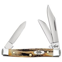 a knife with two blades on top of it