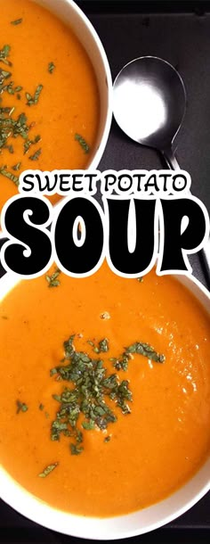 two white bowls filled with soup on top of a black table next to spoons