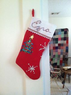 a christmas stocking hanging on the wall