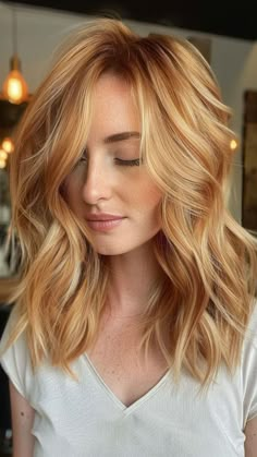 Discover stunning hair styles ideas for date night beauty, braided hairstyles, short hairstyles for women, cute hairstyles, and more. Check the link in bio for a FREE hairstyle treatment product! #HairStylesIdeas #DateNightBeauty #BraidedHairstyles #ShortHairstyleWomen #CuteHairstyles #HairstylesForThinHair #BlondeHair Red Hair With Thick Blonde Highlights, Natural Looking Strawberry Blonde Hair, Pale Copper Blonde Hair, Strawberry Blonde Hair With Curtain Bangs, Strawberry Blonde Face Frame, All Over Strawberry Blonde Color, Cold Strawberry Blonde Hair, Blonde With Strawberry Lowlights Hair, Strawberry Blonde Celebrities