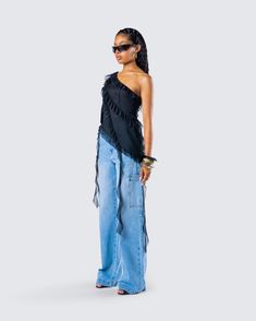 Be on your chicest behavior in this stylish two-piece set 🖤 Pairing a black mesh ruffle top with blue cargo denim pants, this look is perfect for a night out with the girls and some free drinks 😚 Edgy Ruffled Bottoms For Spring, Summer Night Out Jeans With Frayed Hem, Summer Jeans With Frayed Hem For Night Out, Edgy Jeans For A Night Out In Spring, Trendy Denim Tops For Party, Trendy Denim Party Tops, Chic Party Bottoms With Frayed Hem, Black Denim Jeans For Party, Trendy Party Jeans For Spring