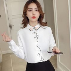 Make your semi-formal get-up go from nay to yay and snag one of these Cute Preppy Cat White Blouses today!This kawaii blouse is made with polyester fabric, guaranteed to give a snug and breathable wear. It features a classic button down closure type with a kawaii twist as it has a strategically shaped edge for a subtle yet bold kawaii cat design. Who says chic wear can't be kawaii too? This Cute Preppy Cat White Blouse sure does not! Specifications: Material: Polyester Collar: Turn-down Collar Office Girl, Sleeve Embroidery, White Shirts Women, White Long Sleeve Blouse, Estilo Preppy, Shirt Female, Style Preppy, Shirt Embroidery, Girl Shirt