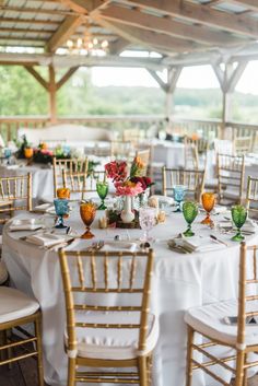 the tables are set up for a wedding reception