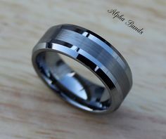 a wedding band that has been made to look like it's in stainless steel