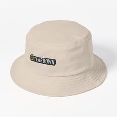 This packable, scrunchable, lightweight headwear classic is ready for adventure, from the beach to the street to the trail Breathable 100% cotton with eyelet ventilation Flat top Moderate brim is 2.2"" (5.5 cm) wide to keep the sun off your face Unstructured crown is 3.1"" (8 cm) deep Easy care: just spot clean and dry in shade. Aesthetic Bucket Hat, All By Myself, Bucket Hat Design, Self Made, By Myself, I Did It, Hats For Sale, Minimalist Aesthetic, Flats Top