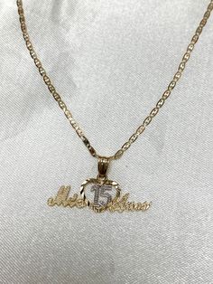 Ioka - 14K Two Tone Gold Sweet 15 Years old Birthday Quinceanera Heart Mis 15 Anos Charm Pendant Necklace with 1.5mm Valentino Chain ✅ PENDANT SPECIFICATIONS:  ➤ Single Sided  ➤ Height: 0.43 in. (11 mm)  ➤ Width: 0.98 in. (25 mm)  ➤ Average Weight: 0.85 gr. ✅ CHAIN SPECIFICATIONS:  ➤ Width: 1.5 mm  ➤ Clasp Type: Spring Ring  ➤ Made with High Quality Metals  ➤ Strong and Secure to hold Pendant charms.  ➤ Fits Into Bale : 2 ✅SHIPPING CONTENTS: ➤14K Gold Chain & Pendant ➤Jewelry Box ✅ PREMIUM 14K G 15 Gold Necklace, Quince Necklace Gold, Quince Necklace Quinceanera, 15 Necklace Quinceanera Gold, Quinceañera Necklace, Quince Necklace, 15 Años Necklace, Quince Jewelry, Quinceanera Necklace