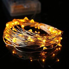 7.5 FT 20 LED Battery Operated Amber Fairy String Lights With Silver Wire - Luna Bazaar | Boho & Vintage Style Decor White Wire Christmas Lights, Unique Wedding Decorations, Starry String Lights, Led Fairy String Lights, Wall Decor Lights, Unique Wedding Decor, Amber Lights, Led Fairy Lights, Light Emitting Diode