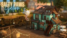 an animated image of a house with lights on the roof and a sign that says salty paws saloon