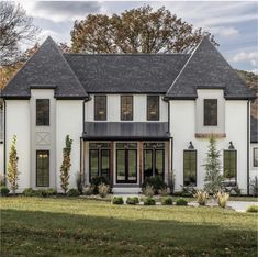 a large white house with lots of windows