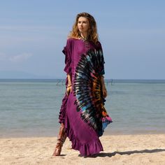 Zinnia Pearl  One size One Plus Size Color: multicolor This stunning maxi kaftan from our Premium Jersey Cotton collection features an extended boat neckline with ruffle trim from neckline to hem. Pull over style  Hi-lo and round hem Drop shoulder sleeves Bust 60 in, length 54 in, sleeve length 20 in Fabric: 100% cotton Ema Hand Tie Dye Maxi Festival Kaftan Dress Jersey Cotton Boho Hippie One Size One Plus size Maxi Kaftan, Hand Tie, Tie Dye Maxi, One Plus, Maxi Robes, Kaftan Dress, Boat Neckline, Womens Tunics, Boho Hippie