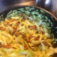 the food is being cooked in the skillet on the stove top and ready to be eaten