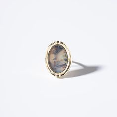 Diameters: 18.7 mm Weight: 8.5 g Plating Material: 18k Gold Decoration: Mother-of-pearlGold plated on Jewelry brass/silverDelivered in Zinfu Fine Jewelry Package. Formal Cameo Signet Ring, Gold Cameo Ring Jewelry, Gold Round Cameo Signet Ring, 14k Stamped Pearl Ring As Gift, Antique Pearl Ring For Formal Occasions, Jewelry Package, Gold Decor, Jewelry Packaging, Mother Of Pearl