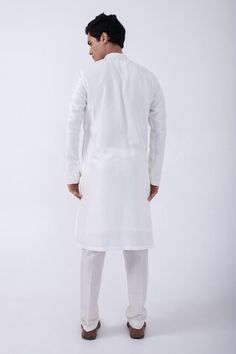 Ivory bam silk kurta with cutdana embroidered collar and cuffs. Comes with ivory cotton silk pyjama. - Aza Fashions White Cotton Silk Fitted Nehru Jacket, White Fitted Cotton Silk Nehru Jacket, White Fitted Nehru Jacket In Cotton Silk, White Cotton Silk Nehru Jacket For Eid, Fitted White Cotton Silk Sherwani, Off White Silk Long Sleeve Kurta, White Silk Nehru Jacket For Eid, Traditional White Silk Nehru Jacket, Collar Work