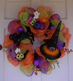 a halloween wreath on the front door