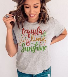 This "Tequila, Lime & Sunshine" design is the perfect, fun Cinco De Mayo shirt for anyone that loves drinks and to celebrate! Fun Holiday Top With Letter Print, Fun Graphic Print Tops For Cinco De Mayo, Fun Tops With Funny Print For Cinco De Mayo, Fun Cinco De Mayo Tops With Funny Print, Fun Cinco De Mayo Funny Print Tops, Chiropractor Humor, Tequila Design, Ugly Christmas Sweater Couples, Drinks Party