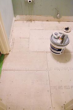 a bathroom floor that is being remodeled