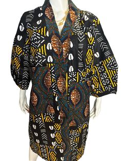 Authentic African Print Ankara Kimono Duster Headwrap set with Pockets is a vibrant and elegant ensemble celebrating traditional African artistry with a modern flair. The kimono duster features authentic Ankara fabric, known for its bold, colorful patterns and intricate designs. Its flowing, open-front silhouette provides a graceful drape, making it a versatile piece for layering over various outfits. The accompanying headwrap complements the kimono with the same eye-catching print and a coordinating design, adding a cohesive and stylish touch to your look. Both pieces are crafted from high-quality fabric, offering comfort and a touch of cultural sophistication. This set blends traditional African prints with contemporary fashion sensibilities, ideal for making a statement on any occasion. Ankara Kimono, Kimono Duster, Colorful Patterns, African Prints, Ankara Fabric, Intricate Designs, Contemporary Fashion, African Print, Head Wraps