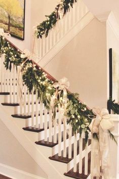 christmas garland on the banisters and stair railing