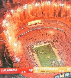 an aerial view of a football stadium with fireworks