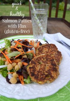 salmon patties with flax gluten - free salad on a white plate