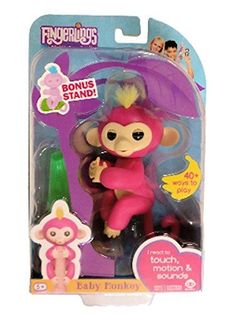 a toy monkey is in the packaging for its new baby monkeys toys set, which includes a