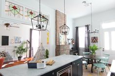 the kitchen is clean and ready to be used as a living room or dining area