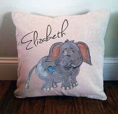 an elephant pillow with the name elizabeth on it