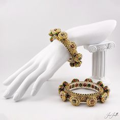 These Rajasthani bangles are beautifully designed with gold plating and adorned with delicate pearls. Perfect for any special occasion, they add a touch of elegance and ethnic charm to any outfit. Elevate your style with these stunning bangles. Round Rock, Pearl Studs, Special Occasion, Gold Plate, Bangles, Plating, Gold, Beauty