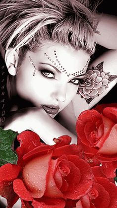 a woman with tattoos and red roses on her face