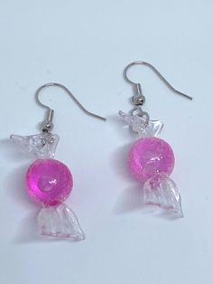 These kawaii pink candy dangle drop earrings are cute and lightweight! They have a glitter finish and are on silver tone fishhook earrings.  The measure about 1 1/8 inch long Crazy Earrings, Candy Earrings, Fishhook Earrings, Pink Kawaii, Pretty Accessories, Kawaii Earrings, Earring Holder, Pinkie Pie, Fish Hook Earrings