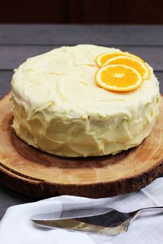 a cake with orange slices on top of it