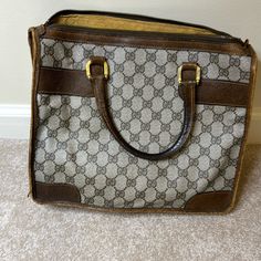 This Is A Good Quality, Authentic, Gucci Bag. It Is Unused Condition. The Pictures Show The Wear On The Edges. The Zipper Is Missing So It Would Need Replaced. The Inside Has No Holes Or Tears In The Fabric. There Is One Small Pen Mark. The Inside Zipper Works. This Bag Just Needs A Little Love And It Will Be A Beautiful Bag To Carry. Again, This Is Preowned Condition , Has Some Wear And Use To It, And Is Missing The Main Zipper Gucci Formal Bag With Zipper Closure, Formal Gucci Shoulder Bag With Zipper Closure, Vintage Gucci Bag For Business, Vintage Gucci Business Bag, Disney Card Holder, Gucci Bucket Hat, Gucci Cat Eye Sunglasses, Key Holder Wallet, Gucci Eyeglasses