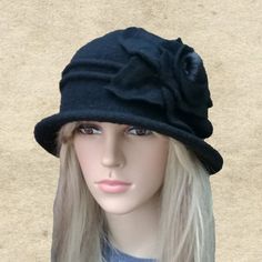 This felted wool cloche hat is very warm. It's perfect to wear in fall/winter seasons. The hat is lightweight and easy to wear. It's well match with any outfits.One size fits most an average women's head (21.5" - 22.5")Composition: 100% WoolHand wash in cold water and lay flat to dry. Do not use a dryer!NOTEActual color may slightly different depending on your monitor.Please contact us if you have any questions for the color. Wool Brimmed Cloche Hat For Winter, Winter Wool Brimmed Cloche Hat, Winter Wool Cloche Hat, Winter Wool Cloche Felt Hat, Adjustable Wool Brimmed Cloche Hat, Adjustable Brimmed Wool Cloche Hat, Warm Short Brim Cloche Hat For Winter, Winter Wool Mini Hat With Curved Brim, Winter Fur Felt Hat