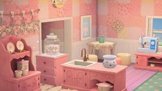 a pink dollhouse with furniture and accessories in the living room, kitchen and bedroom area