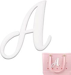 the letter a is next to a pink handbag and it's white handle