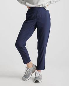 These look like classic work pants, but move like your favorite activewear. Our lightweight, breathable Performance Tech Commuter Pants have just the right amount of stretch for days when you’re on the go, plus the sun protection and quick-dry properties of top-notch performance wear.  | Quince | Women's Performance Tech Ankle Pants in Navy, Size XL, Recycled Polyester Travel Pants Women, Ankle Pants Women, Silk Tee, Batwing Sweater, Travel Pants, Perfect Pant, Black Travel, Performance Wear, Silk Shorts