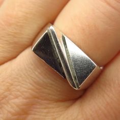 925 Sterling Silver Vintage Mexico Modernist Design Ring Size 7 3/4Weight: 11.0gWELCOME TO PAWN SHOPWe are an actual pawn shop and have been in business for over 25 years.Since 1990, our establishment has been serving a variety of clients by providing them with short term cash solutions and options of liquidity regarding their treasured heirlooms.Acknowledging that today′s customers are very sophisticated and are looking for a variety of investments, our acquisitions are hand-picked for our spec Silver Art Deco Signet Ring With Polished Finish, Art Deco Silver Signet Ring With Polished Finish, Silver Art Deco Rings With Polished Finish, Modernist Stamped 925 Rings For Anniversary, Modernist Wide Band Rings For Anniversary, Modernist Sterling Silver Signet Ring For Anniversary, Silver Modernist Signet Ring For Gift, Vintage Mexico, Modernist Design