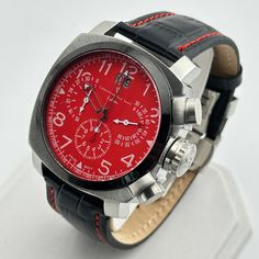 Stainless steel case Black leather strap Bright red dial Swiss Quartz Movement scratch-resistant mineral water resistant up to 10 ATM - 100 meters - 330 feet freshly installed battery chronograph stopwatch Formal Red Watch With Analog Display, Red Formal Watch Accessories With Analog Display, Formal Red Watch Accessories With Analog Display, Red Watches With Tachymeter And Round Dial, Red Chronograph Watch With Subdials, Red Watch With Tachymeter And Round Dial, Red Chronograph Watch For Business, Red Business Watch With Analog Display, Luxury Automatic Red Watch Accessories