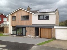 a house with a solar panel on the roof