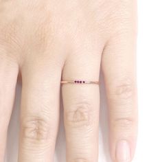 ◈ Brilliant Forever ◈ 1.2mm Simple Ruby Ring / Dainty Ruby Band. Wedding Band / Ruby Ring / 14k Rose Gold Wedding Band / Dainty Ruby Band / 14k Solid Gold Ring ● 1.2mm Dainty Ruby Ring ● - 14k Solid White Gold. Rose Gold. Yellow Gold - Band Width : 1.2mm - Setting Type: Prong - Diamond Total Carat Weight : 0.028CT. - Number Of Diamond : 4 Ruby - Diamond Color : G - Diamond Clarity : VS2 - SI1 - Diamond Cut: Brilliant Round Cut - Diamond Size : 1.1mm - 100% Natural Diamonds - Non-Conflict Diamond 14k Gold Band Ring Gift, 14k Gold Band Ring For Gift, 14k Gold Band Ring As Gift, Anniversary 14k Gold Band Rings, Rose Gold Ruby Ring For Anniversary In 14k Gold, 14k Gold Bands With Prong Setting As Gift, Dainty Ruby Ring, Ruby Wedding Band, Stacked Wedding Bands