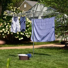 clothes hanging out to dry in the yard