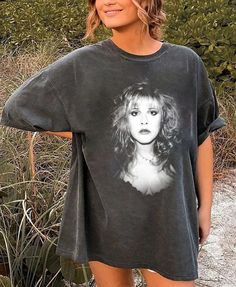 90s Stevie Nicks Music shirt, Stevie Nicks Tour 2024 Shirt, Graphic Stevie Nicks Tour Live In Concert T-shirt, Stevie Nicks Gift for fans ⭐ PRODUCT NAME: Karol G Vintage T-Shirt, Karol Gift For Women And Man Unisex T-Shirt, Unisex Vintage Bangtan Group T-Shirt, Oversized Retro Bootleg Tee ⭐ INFORMATION: This unisex style t-shirt is suitable for both men and women. For care, wash the item inside out in cold water. Avoid bleach, dry cleaning, and direct ironing on the design. ⭐ MATERIAL DETAILS: O Casual Tops For Music Festivals And Alternative Fashion, Oversized Grunge Top For Concerts, Grunge Relaxed Fit Top For Concerts, Relaxed Fit Grunge Top For Concerts, 90s Style Concert T-shirt, Alternative Style T-shirt For Spring Concert, Alternative Short Sleeve Top For Concert, Oversized 90s Style Fan Merchandise Top, 90s Relaxed Fit T-shirt For Concerts