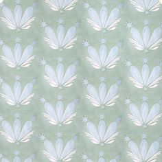 a blue and white flower pattern on a light green background with circles in the center