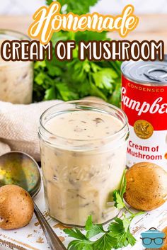 homemade cream of mushroom soup in a jar with spoons and parsley on the side