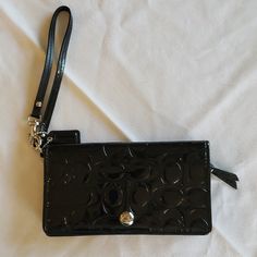 Coach New With Out Tags Wristlet Wallet. New Never Used. Shiny Black. Black Wristlet With Cell Phone Pocket For Gift, Black Clutch Wallet With Wrist Strap, Black Wristlet With Cell Phone Pocket As Gift, Black Wallet With Wrist Strap For Gift, Black Rectangular Wristlet With Card Slots, Black Wallet With Wrist Strap As Gift, Black Clutch Wristlet With Cell Phone Pocket, Black Wristlet Clutch With Cell Phone Pocket, Black Wristlet Pouch With Cell Phone Pocket